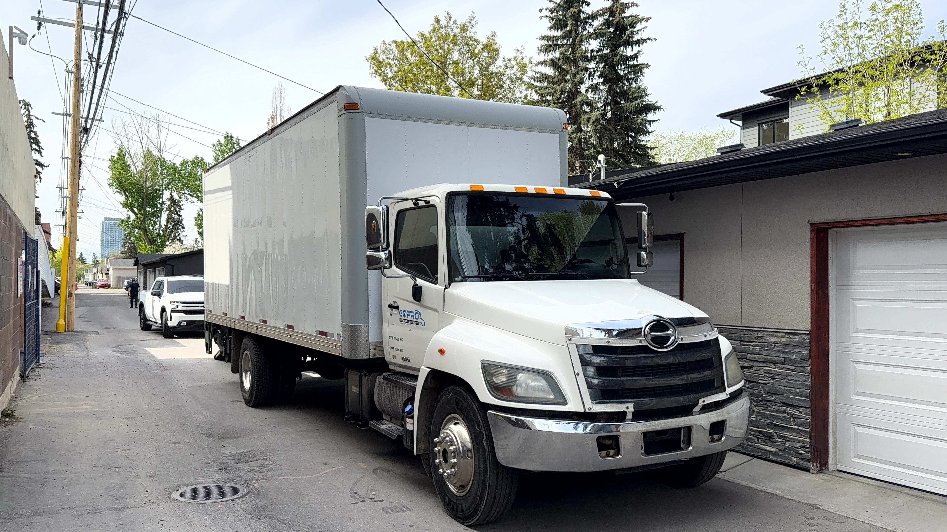 Best Calgary Movers crew prepping furniture with protective blankets